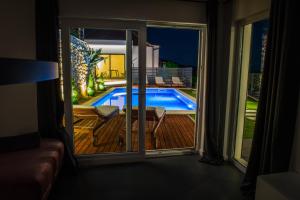 Bazén v ubytovaní Villa Magic look alebo v jeho blízkosti