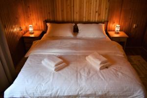 Posteľ alebo postele v izbe v ubytovaní Srna Chalet - Rooms