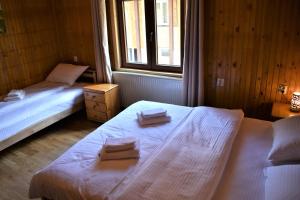 Posteľ alebo postele v izbe v ubytovaní Srna Chalet - Rooms
