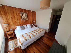 Postel nebo postele na pokoji v ubytování Patagonia Route B&B