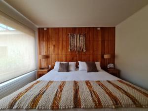 Postel nebo postele na pokoji v ubytování Patagonia Route B&B