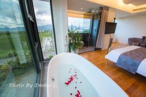 Postel nebo postele na pokoji v ubytování Han-Shian Boutique B&B