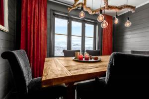 Posezení v ubytování Hemsedal-Toppen av Skarsnuten + 24 fotografií