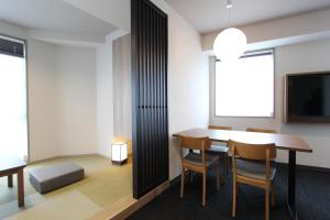 Sjónvarps- og/eða afþreyingartæki á KOKO HOTEL Residence Asakusa Tawaramachi