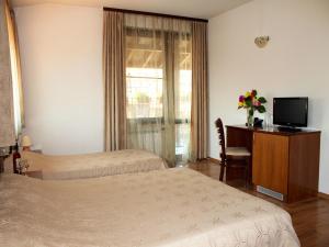 Krevet ili kreveti u jedinici u okviru objekta Bizev Hotel