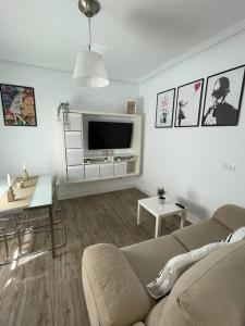Televízia a/alebo spoločenská miestnosť v ubytovaní Atico duplex con Terraza en pleno centro de Jerez