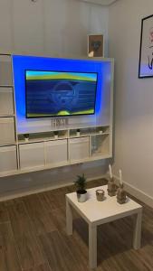 Televízia a/alebo spoločenská miestnosť v ubytovaní Atico duplex con Terraza en pleno centro de Jerez