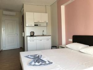 A kitchen or kitchenette at dpatina
