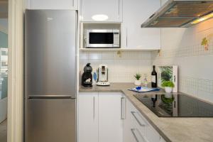 Kuchyň nebo kuchyňský kout v ubytování Apartment 3d Albir
