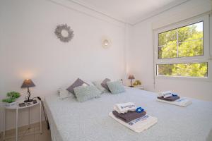 Postel nebo postele na pokoji v ubytování Apartment 3d Albir
