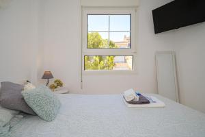 Postel nebo postele na pokoji v ubytování Apartment 3d Albir