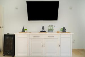 TV a/nebo společenská místnost v ubytování Apartment 3d Albir