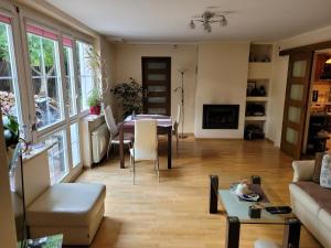 a living room with a couch and a table at Duńska house in Kielce