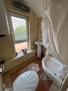 Koupelna v ubytování Apartman Lora