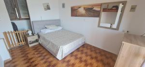 Postel nebo postele na pokoji v ubytování Haraki House