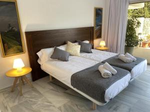 Posteľ alebo postele v izbe v ubytovaní 2 apartamentos muy luminosos con grandes terraza + 32 fotografií
