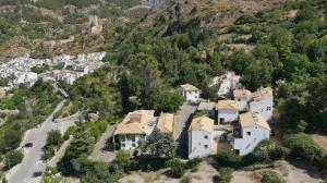 an aerial view of a village on a mountain at Villa Turística de Cazorla in Cazorla