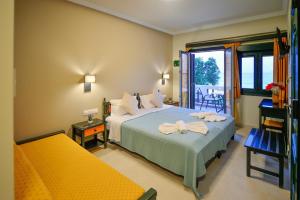 Posteľ alebo postele v izbe v ubytovaní Maria Beach Hotel