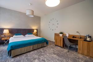 Posteľ alebo postele v izbe v ubytovaní Tulip Hotels - Wroclaw Patio