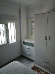 Łóżko lub łóżka w pokoju w obiekcie Hormaza Chiclana