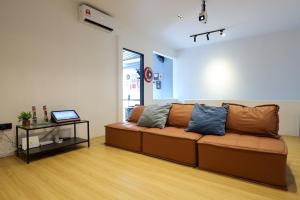 Posezení v ubytování Cozy Homestay with Karaoke System & Pool Table