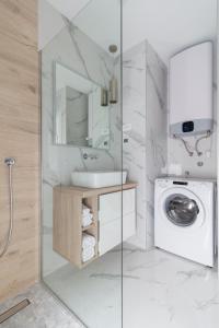 Koupelna v ubytování Luxury beachfront Villa Crystal Aenona - by TA Leut Agency