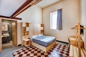 Postelja oz. postelje v sobi nastanitve Rifugio di Mare