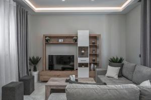 Χώρος καθιστικού στο Blue Wind Villa II
