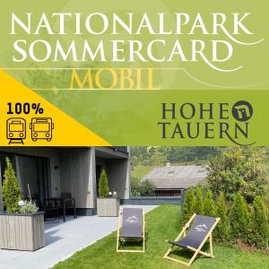 two lawn chairs sitting in a yard with the words national park commend miami hotel at Simple Life Apartments in Rauris