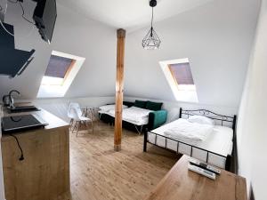 מיטה או מיטות בחדר ב-Willa Azul - Podgrzewany basen, klimatyzacja w całym obiekcie
