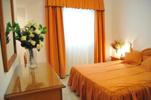 Giường trong phòng chung tại EmyCanarias Holiday Homes Vecindario