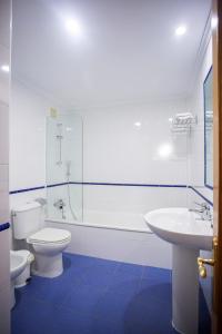 Kylpyhuone majoituspaikassa HOTEL PALACIO DE FIAME
