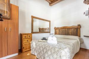 Posteľ alebo postele v izbe v ubytovaní Casa Rural El Ventorrillo