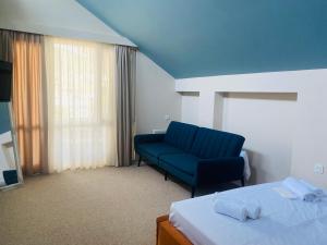 Postel nebo postele na pokoji v ubytování Mose art Hotel