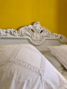 Un pat sau paturi într-o cameră la B&B Buongiorno Salento