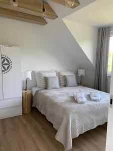 Posteľ alebo postele v izbe v ubytovaní Osada Szczyrk - prywatna sauna&jacuzzi