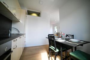 Kuchyň nebo kuchyňský kout v ubytování Apartment Bine