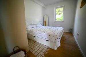 Postel nebo postele na pokoji v ubytování Apartment Bine