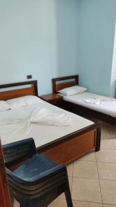 Postel nebo postele na pokoji v ubytování Festim hotel
