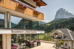 a hotel with a view of a mountain at Hotel Residence Gardena Stevia 307 in Santa Cristina Gherdëina