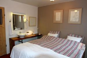 Letto o letti in una camera di Eric the Red Guesthouse