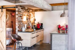 Kuchnia lub aneks kuchenny w obiekcie NATURE HOUSE Pszczyna