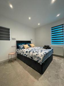 Star London Finchley Road 3-Bed Retreat tesisinde bir odada yatak veya yataklar