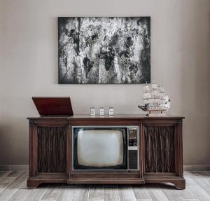 TV a/nebo společenská místnost v ubytování Hotel Eleni