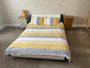 Łóżko lub łóżka w pokoju w obiekcie Hereward
