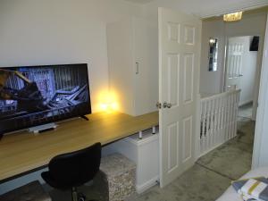 TV i/ili multimedijalni sistem u objektu Ramskir Apartment