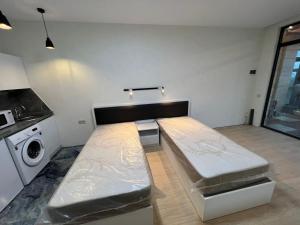 Postel nebo postele na pokoji v ubytování Batumi Hotel R&M