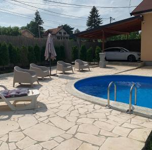 Bazén v ubytování Mika’s Poolhouse nebo v jeho okolí