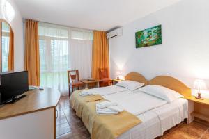 Postel nebo postele na pokoji v ubytování Hotel Cerna