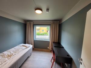 Ένα ή περισσότερα κρεβάτια σε δωμάτιο στο Telemark Apartments Langgt 48